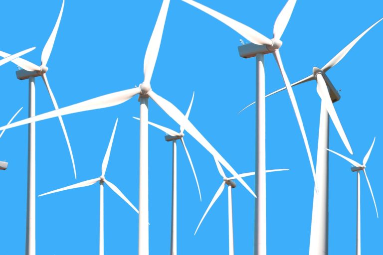 An outdoor field of power-generating windmills.