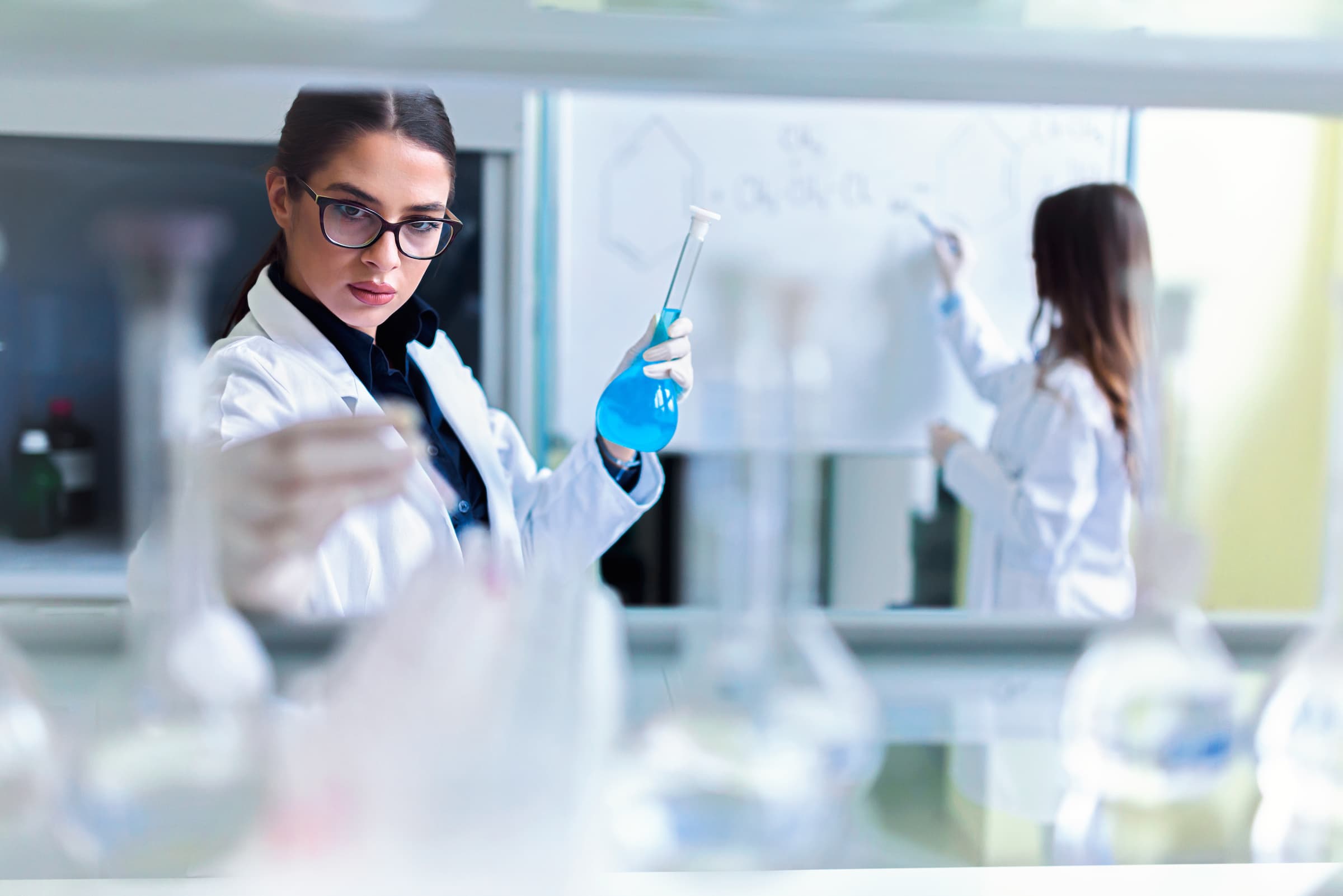 Female scientist in a biotech lab