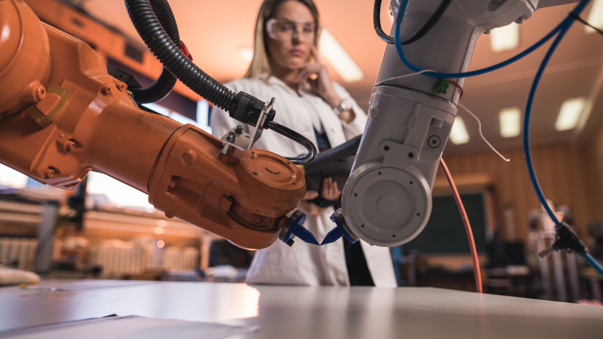 Scientist working on a robotic arm