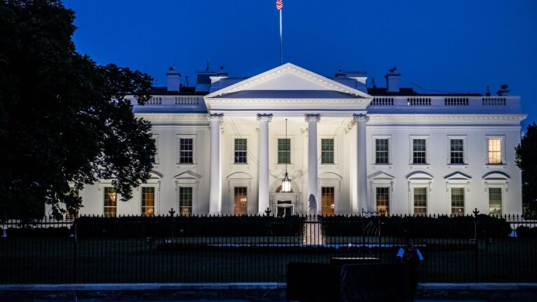 Image of the white house at twilight. Cowen's Big List tackles over 60 Team Biden policies and the risk for banks, consumer finance, cryptocurrency, housing markets and cannabis.