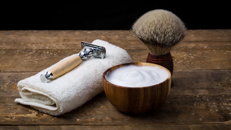Cowen Insights hosts Jeff Raider, Co-Founder, and Co-CEO of Harry’s, a brand focused on high-quality men’s shaving and grooming products. Upscale shaving kit with shaving cream in a brown bowl, razor laid on top of a folded face towel and brown men's shaving brush is the image.