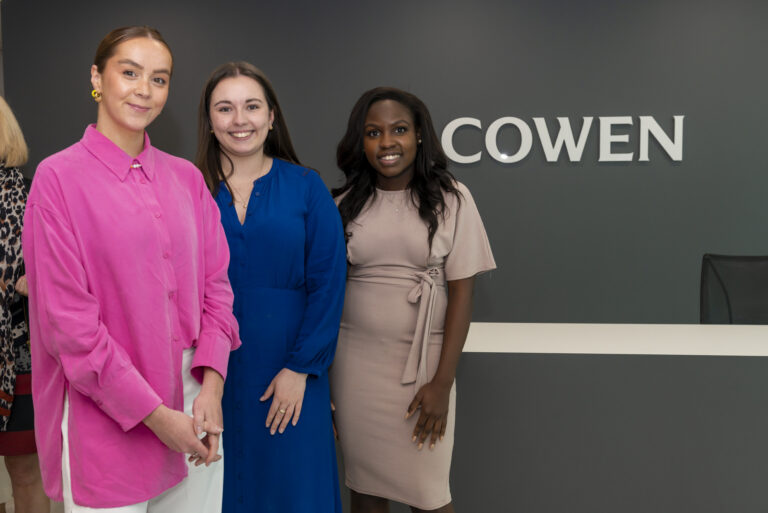 Photo of three women at the Cowen London office