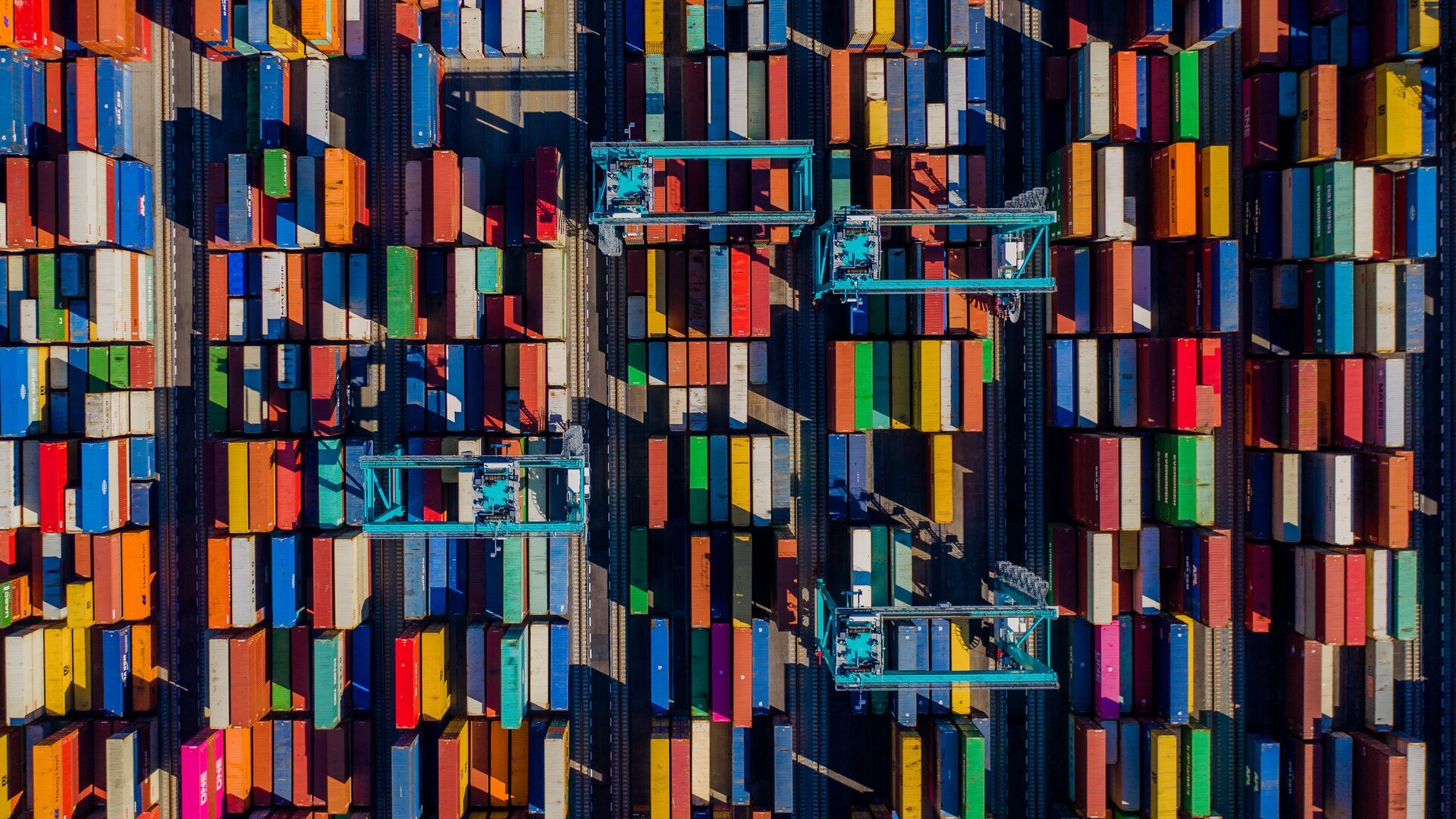 An overhead view of a sea of shipping containers.