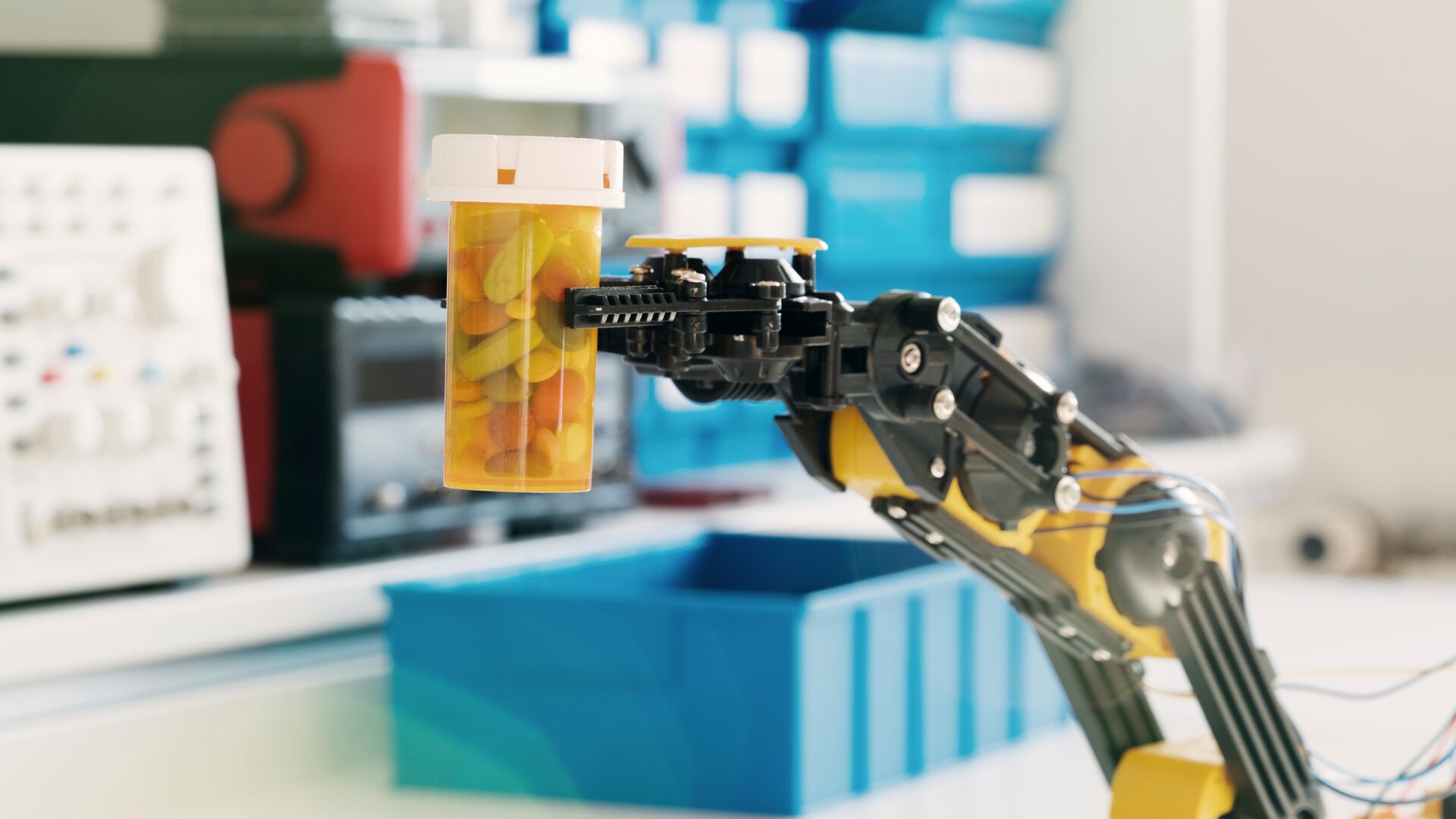 Robotic Arm carrying a pull bottle. Representing the impact of AI on pharma R&D.